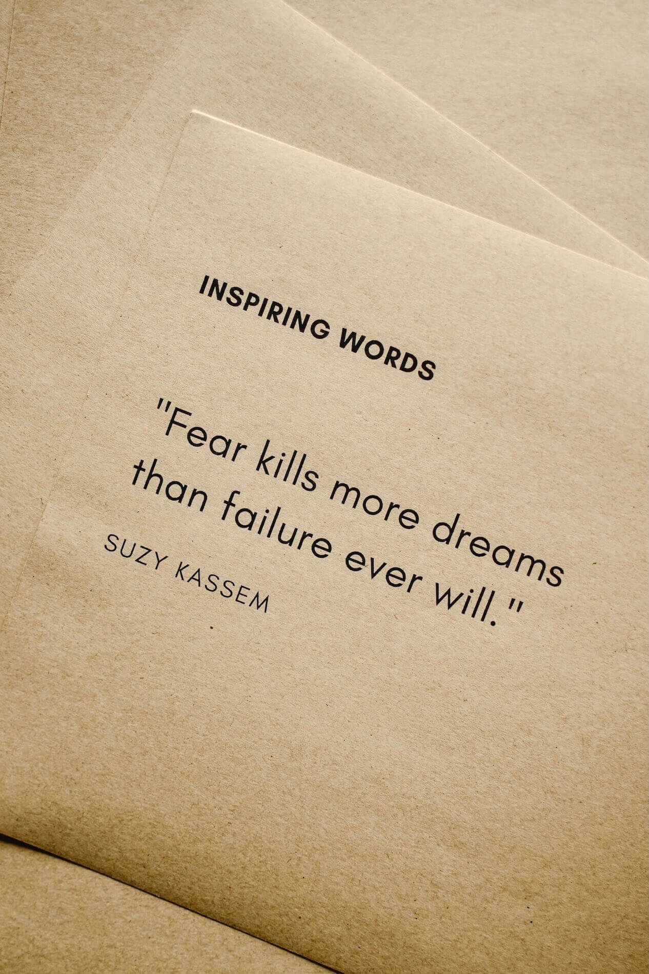 Inspirational quote about fear: "Fear kills more dreams than failure ever will." by Suzy Kassem. Fear of Success concept.