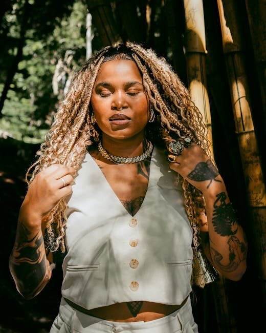 Serene woman with blonde braids, practicing somatic awareness and healing from trauma.