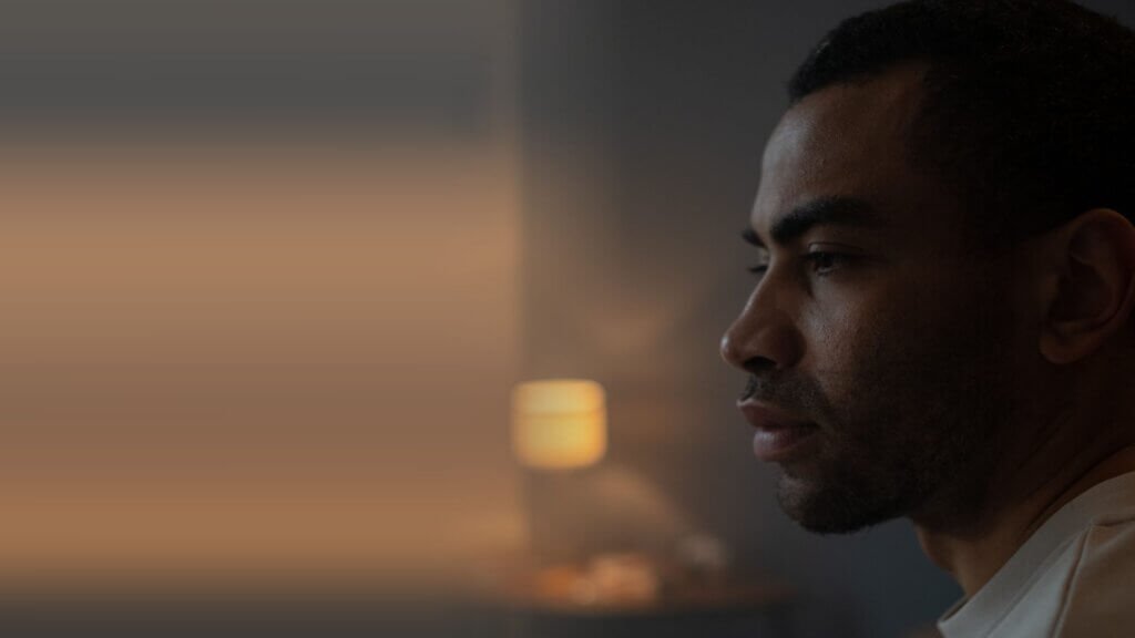 Man reflecting at home β attachment trauma therapy in San Diego